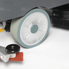Compact floor scrubber